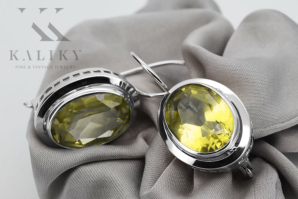 Vintage Yellow Peridot Earrings in Sterling Silver (vec114s-yp) — worn on the hand, showing profile