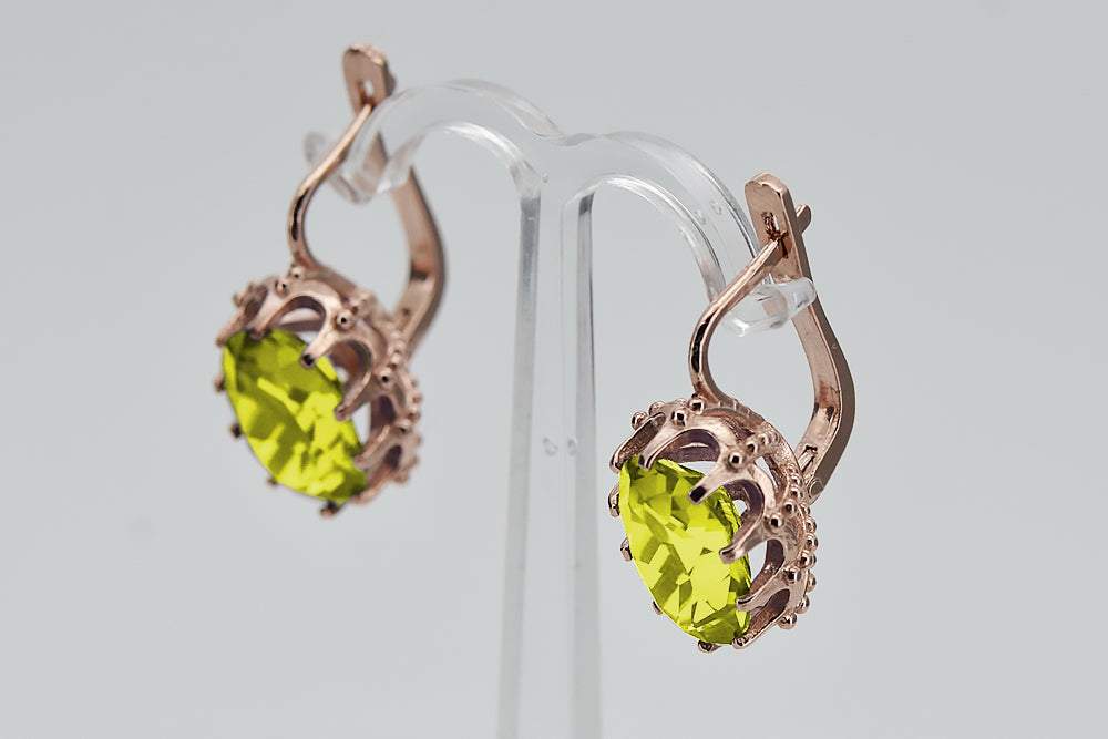 Vintage Yellow Peridot Earrings in 14K Rose Gold (vec079r-yp) — worn on the hand, showing profile