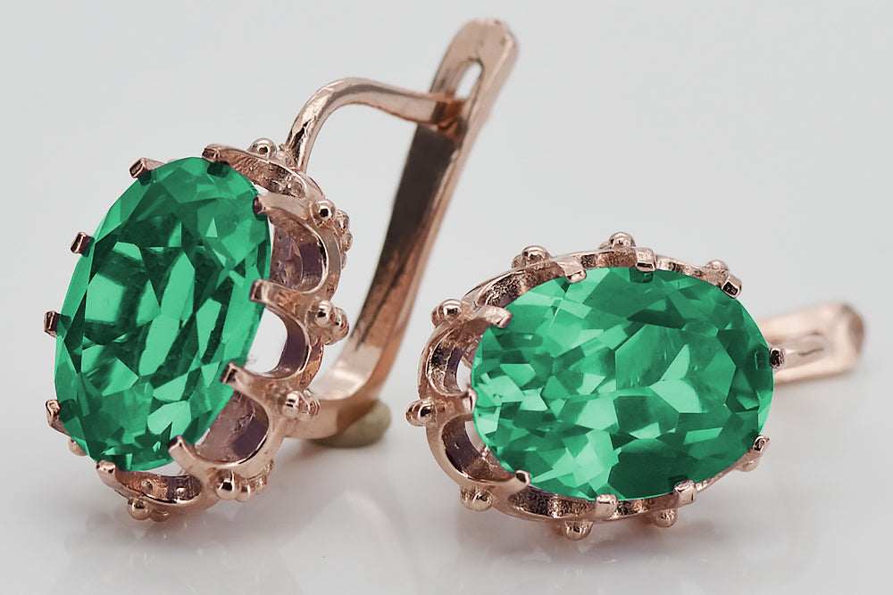 Vintage Emerald Earrings in 14K Rose Gold (vec079r-em) — angled view catching the light