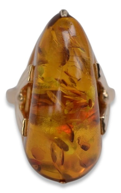 Vintage Amber Ring in 14K Rose Gold (vrab040) — worn on the neckline, showing the drape