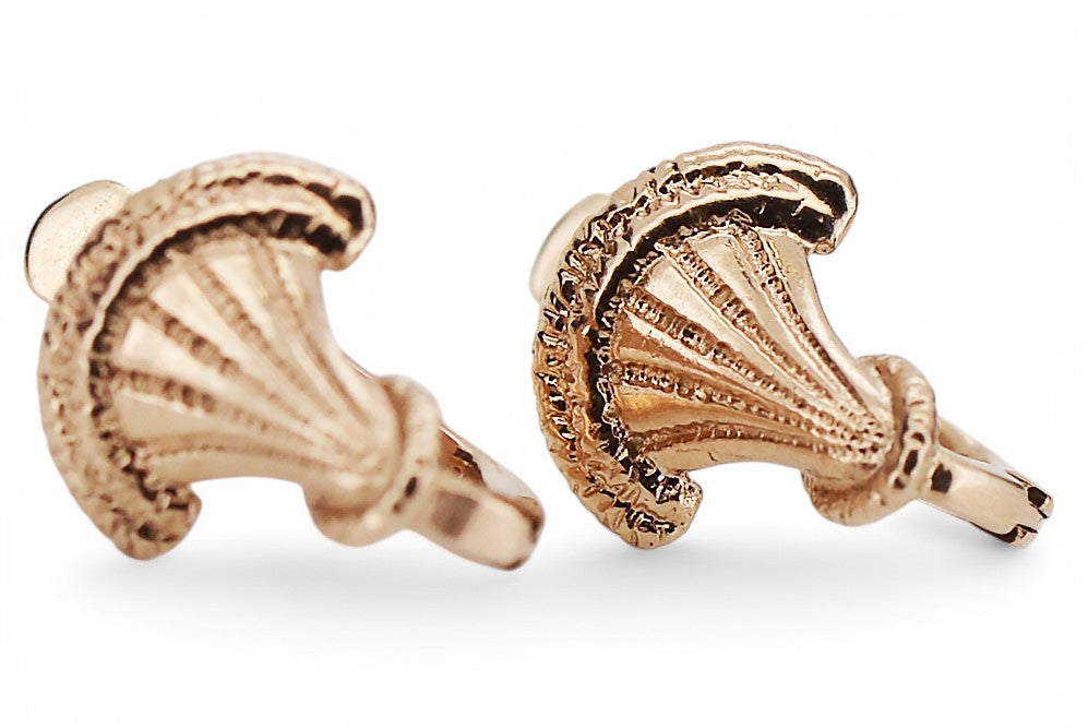 Vintage Leaf Earrings in 14K Rose Gold (ven214) — worn on the neckline, showing the drape