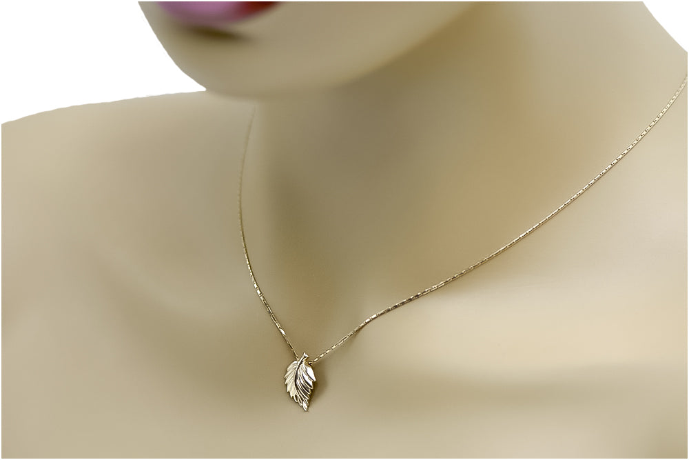Vintage Leaf Pendant in 14K Rose Gold (vpn054) — close-up of the hallmark on the inner band