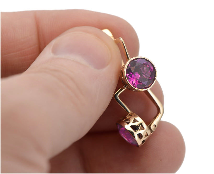 Vintage Amethyst Earrings in 14K Rose Gold (vec107r-am) — worn on the hand, showing profile