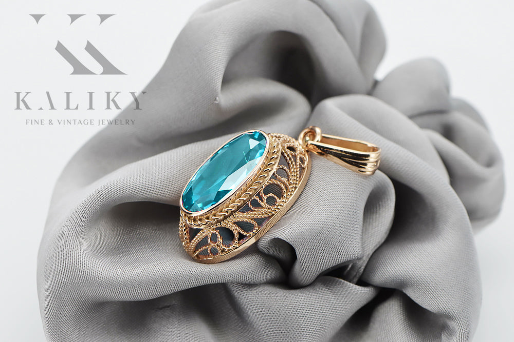 Vintage Aquamarine Pendant in 14K Rose Gold (vpc014r-aq) — worn on the hand, showing profile
