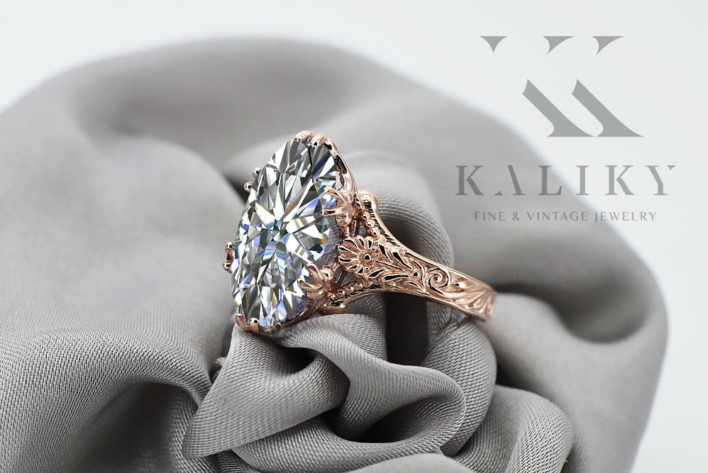 Vintage Zircon Oval Cubic Zirconia Ring in 14K Rose Gold (vrc084r-zi) — worn on the neckline, showing the drape
