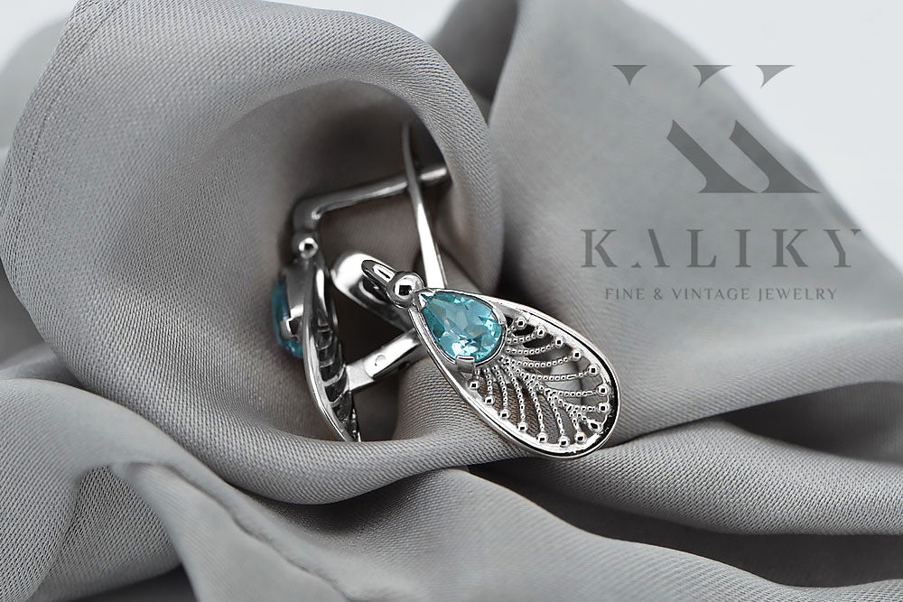Vintage Aquamarine Earrings in Sterling Silver (vec067s-aq) — worn on the hand, showing profile