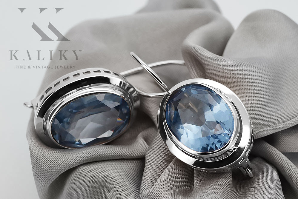 Vintage Aquamarine Earrings in Sterling Silver (vec114s-aq) — worn on the hand, showing profile