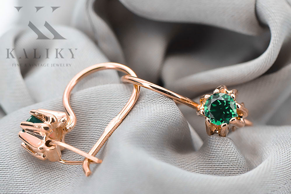 Vintage Emerald Craft Earrings in 14K Rose Gold (vec053r-em) — worn on the neckline, showing the drape