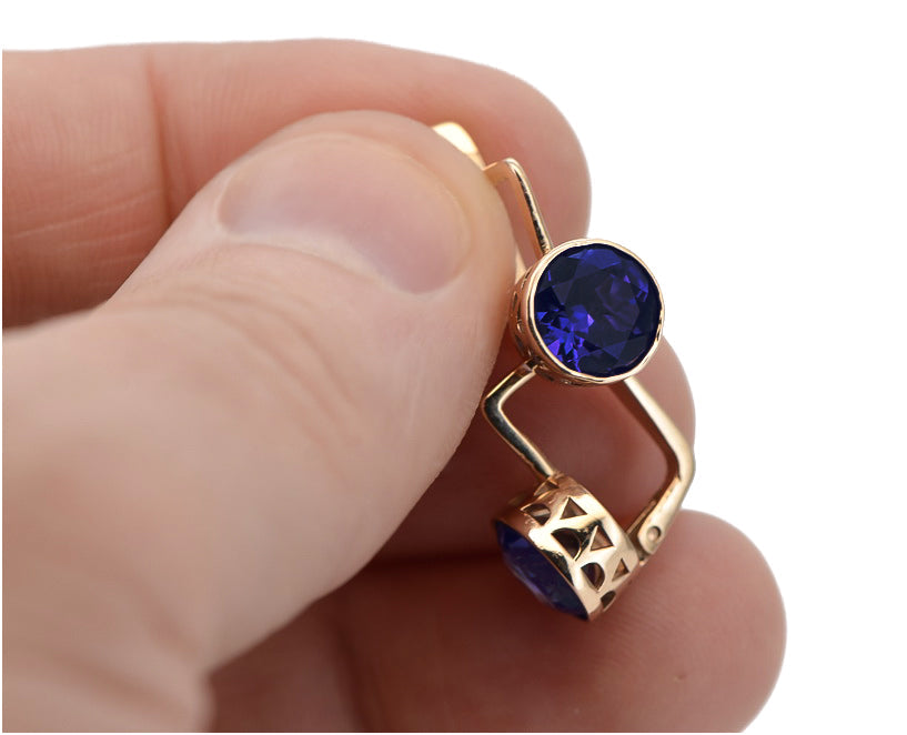 Vintage Sapphire Earrings in 14K Rose Gold (vec107r-sp) — worn on the hand, showing profile