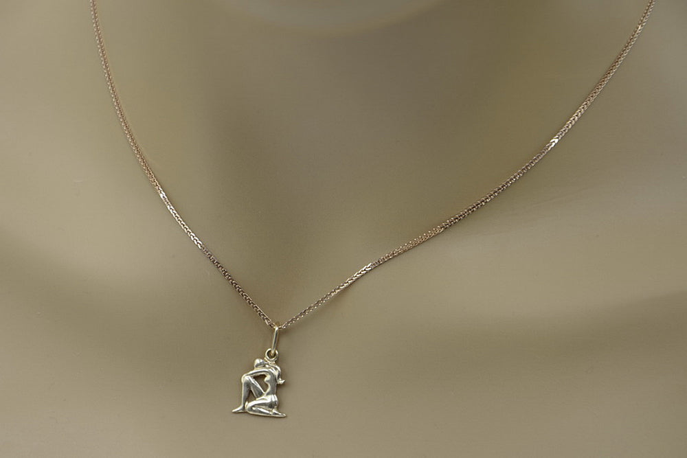Vintage Aries Lady Zodiac Pendant Vzp Pendant in 14K Rose Gold (f0t7oz) — worn on the hand, showing profile