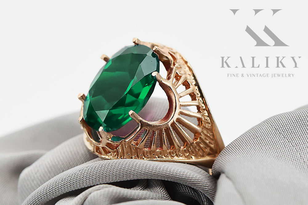 Vintage Emerald Ring in 14K Rose Gold (vrc003r-em) — worn on the neckline, showing the drape