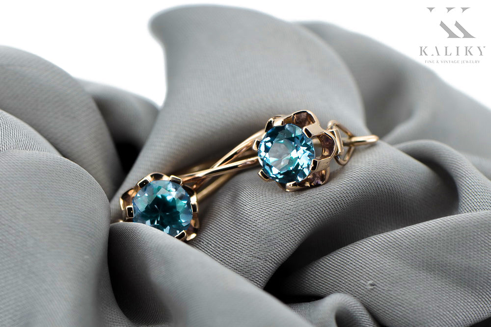 Vintage Aquamarine Earrings in 14K Rose Gold (vec019r-aq) — worn on the hand, showing profile