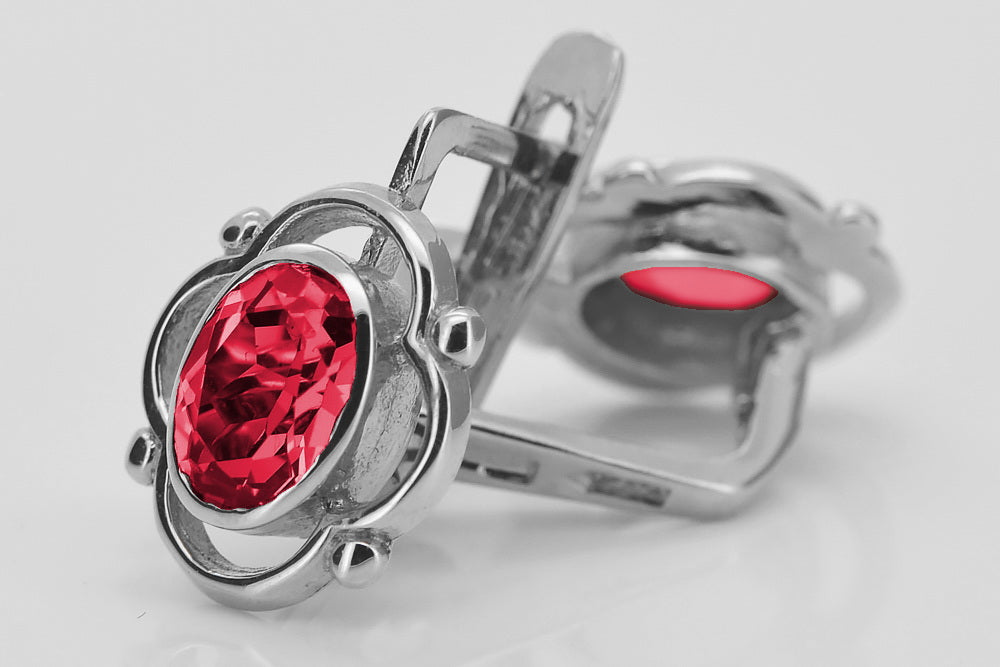 Vintage Ruby Earrings in Sterling Silver (vec033s-rb) — worn on the neckline, showing the drape