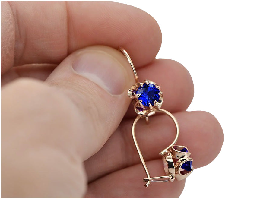 Vintage Sapphire Earrings in 14K Rose Gold (vec035r-sp) — worn on the hand, showing profile