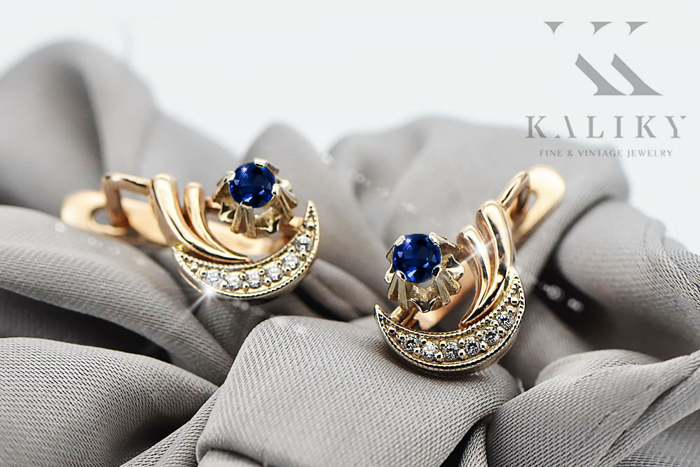 Vintage Sapphire Earrings in 14K Rose & White Gold (vec093rw-sp) — worn on the neckline, showing the drape
