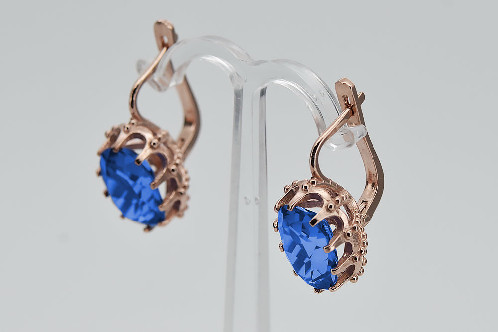 Vintage Alexandrite Sapphire Earrings in 14K Rose Gold (vec079r-sp) — worn on the hand, showing profile