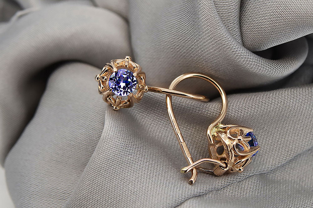 Vintage Sapphire Made Earrings in 14K Rose Gold (vec145r-sp) — worn on the hand, showing profile