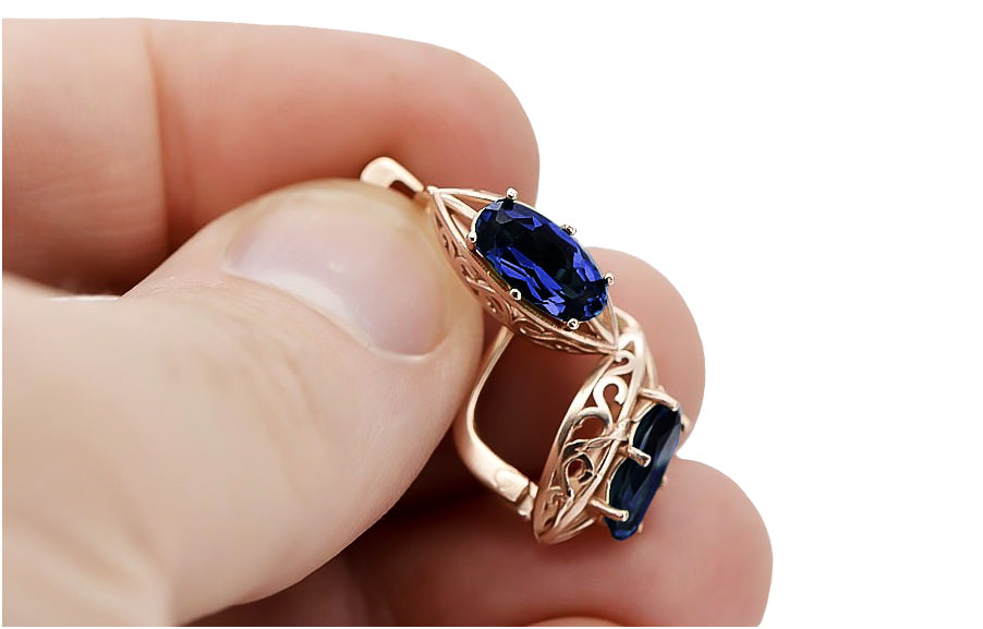 Vintage Sapphire Earrings in 14K Rose Gold (vec141r-sp) — worn on the hand, showing profile
