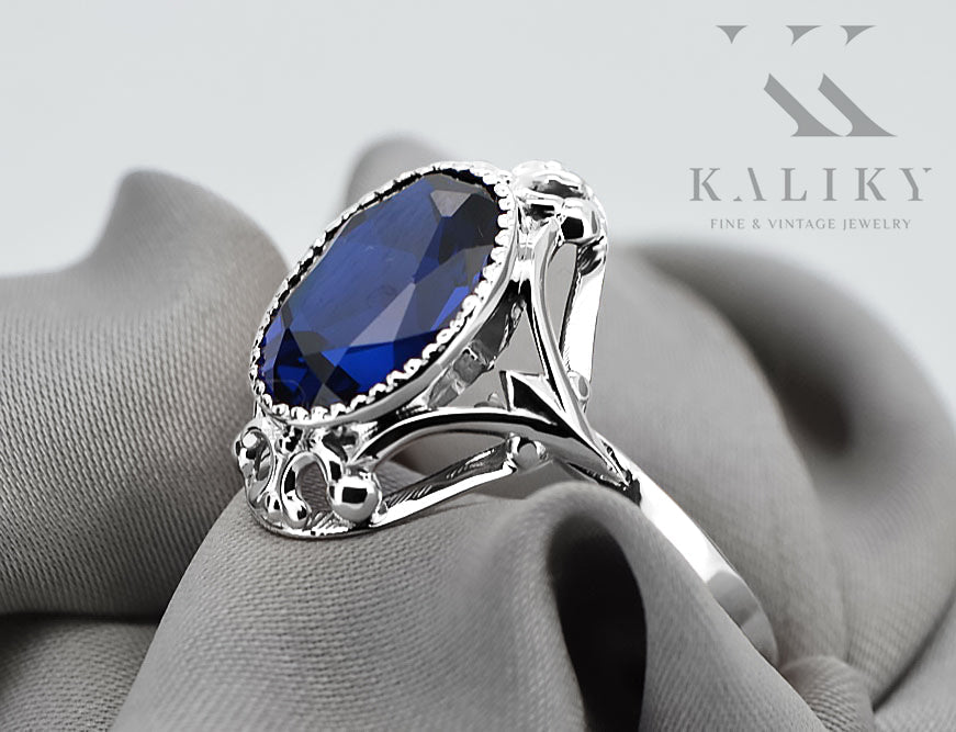 Vintage Sapphire Ring in Sterling Silver (vrc128s-sp) — worn on the hand, showing profile