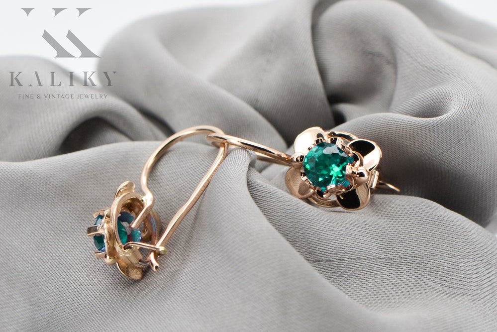 Vintage Emerald Earrings in 14K Rose Gold (vec116r-em) — worn on the neckline, showing the drape
