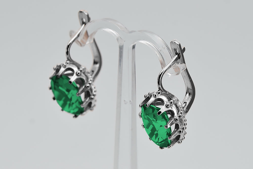 Vintage Emerald Earrings in Sterling Silver (vec079s-em) — worn on the hand, showing profile