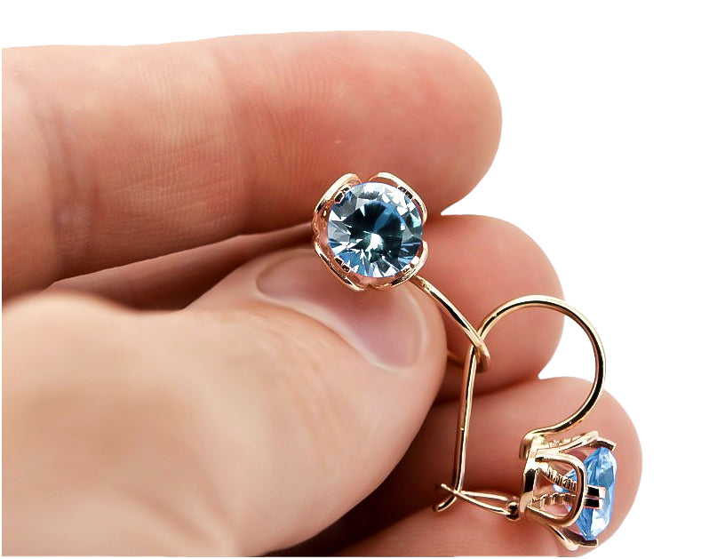 Vintage Aquamarine Earrings in 14K Rose Gold (vec029r-aq) — worn on the hand, showing profile