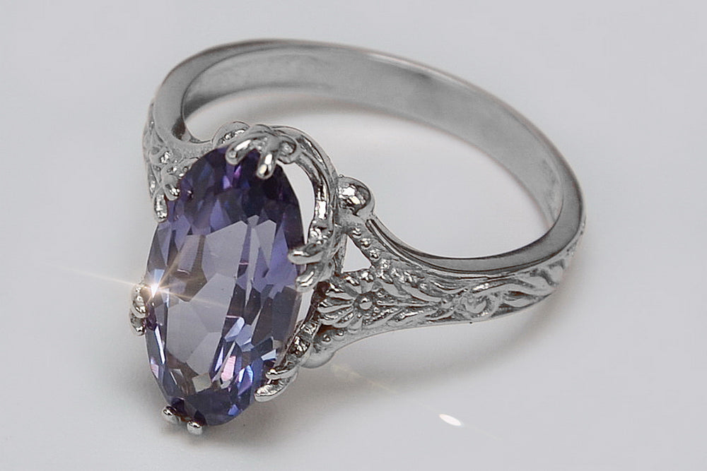 Vintage Alexandrite Oval Ring in Sterling Silver (vrc084s-ax) — worn on the neckline, showing the drape
