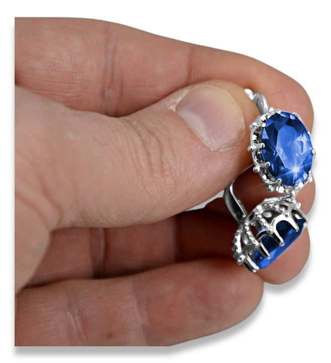 Vintage Sapphire Earrings in Sterling Silver (vec079s-sp) — worn on the hand, showing profile