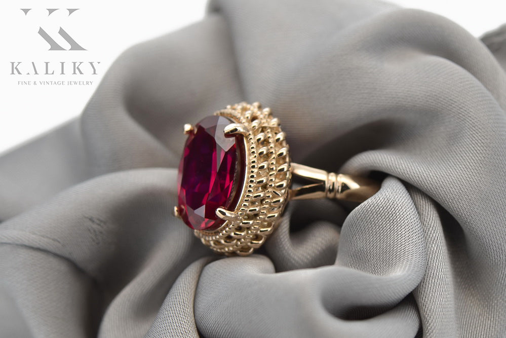 Vintage Ruby Ring in 14K Rose Gold (vrc068r-rb) — worn on the neckline, showing the drape