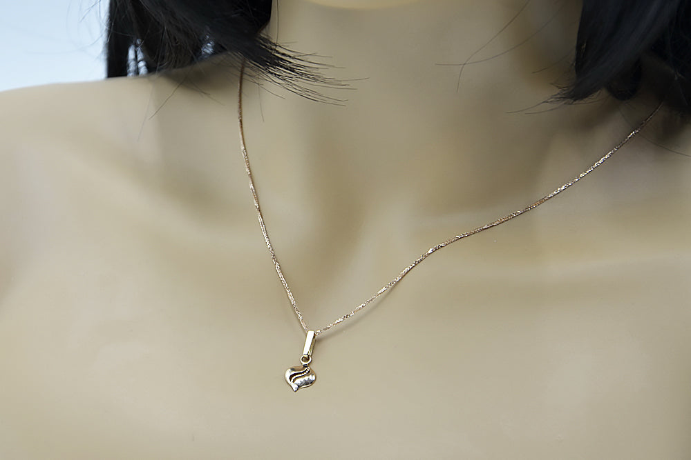 Vintage Leaf Pendant in 14K Rose Gold (vpn005) — worn on the hand, showing profile