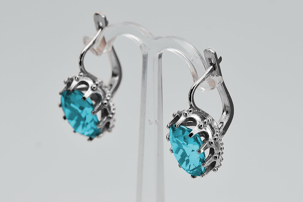 Vintage Aquamarine Earrings in Sterling Silver (vec079s-aq) — worn on the hand, showing profile